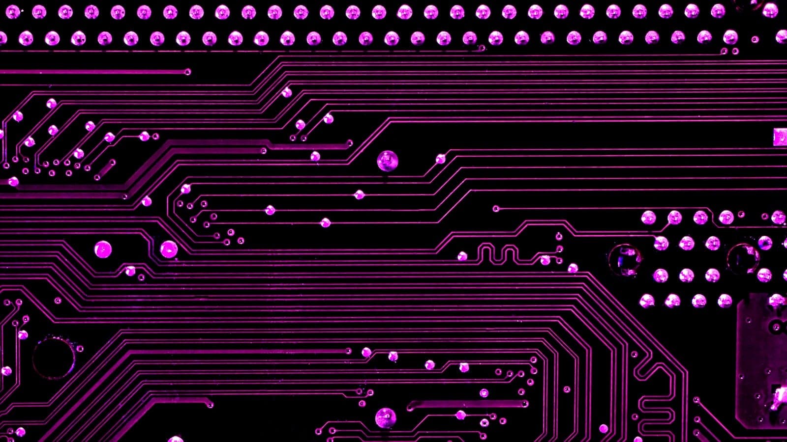 Macro photograph of an illuminated computer circuit board